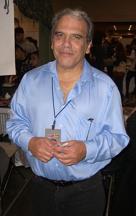 Valentino standing at a convention