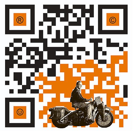 Example of a QR code with artistic embellishment that will still scan correctly thanks to error correction