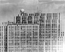 Former "RCA" signage at the top of 30 Rockefeller Plaza, removed after RCA's 1985 purchase by GE 30 Rockefeller Plaza New York City RCA GE Building.jpg