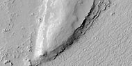 Close view of layers from previous image, as seen by HiRISE under HiWish program. Some dark slope streaks are visible.