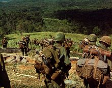 Members of Co. C, 1st Bn, 8th Inf, 1st Bde, 4th Inf Div, descend the side of Hill 742, located five miles northwest of Dak To. 14-17 November 1967. 8th Infantry Rgt. descending Hill 742 during Operation MacArthur 1967-11.jpg