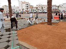 Pakistani labor at Al Masjid Nabawi (the Prophet's Mosque) in Medina Al Masjid Nabavi Madina pakistani labor - panoramio.jpg