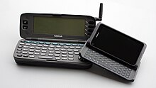 A Nokia 9000 Communicator (1996) next to a Nokia E7 Communicator (2011) As Time Goes By (Nokia 9000 Communicator & E7).jpg