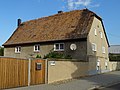 House and enclosure of a farm