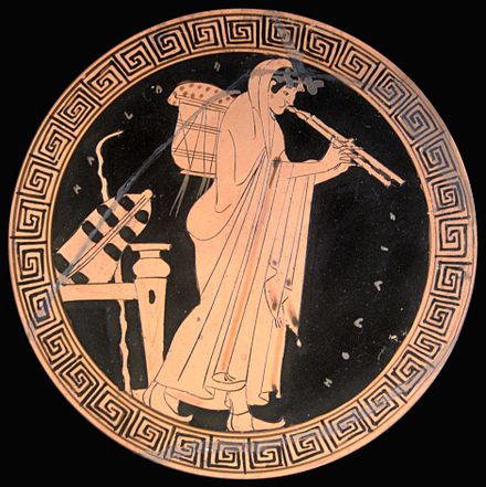 The aulos was an instrument that might accompany the singing of elegies (Brygos Painter, Attic red-figured kylix, ca. 490 BC)