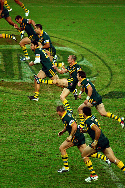 Darren Lockyer (fourth from bottom), Australia's most-capped player, kicking off for the national team in 2009.
