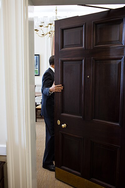 File:Barack Obama holds the door, 2011.jpg