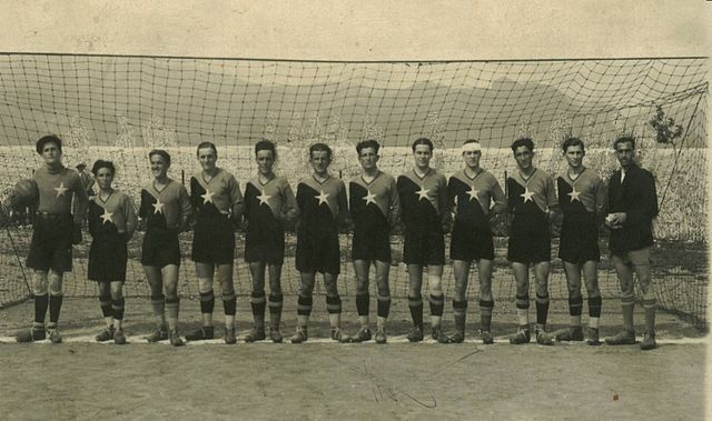 Left-right: Kin Bushati (goalkeeper), Ernest Halepiani, Gjelosh Gjeka, Pjeter Gjoka, Qazim Dervishi (captain), Muhamet Halili, Asim Golemi, Luigj Rado