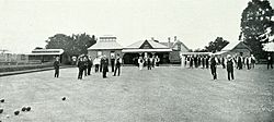 Parramatta Bowling Club in 1911, with the Macquarie Street Gatehouse in the background, behind the clubhouse Bowling club and gatehouse Parramatta 1911.jpg