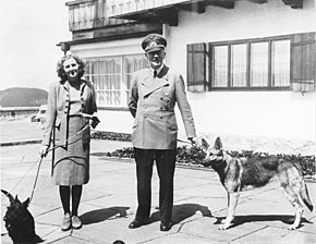 Eva Braun and Hitler at Berchtesgaden (with Hitler's dog Blondi at right), June 1942 Bundesarchiv B 145 Bild-F051673-0059, Adolf Hitler und Eva Braun auf dem Berghof.jpg