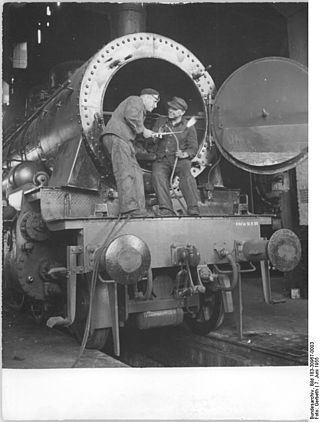German locomotive maintenance workers