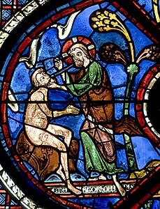 Detail van het raam van de Barmhartige Samaritaan