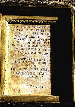 1604 inscription with Psalm 41. Chubb's Almshouses, Crewkerne, United Kingdom