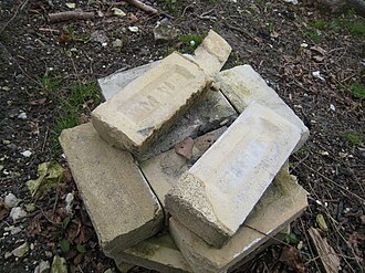 A stack of Midhurst White bricks at the former Cocking chalk pit. Cocking Lime Works 001.JPG