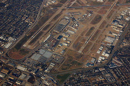 Dallas Love Field, Mockingbird Lane is the road furthest foreground, while Cedar Springs Road is the road connecting to the terminal DallasLoveFieldAerial-2009-a.JPG