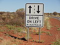 Road sign near Uluru/Ayers Rock reminding foreign drivers to keep left.
