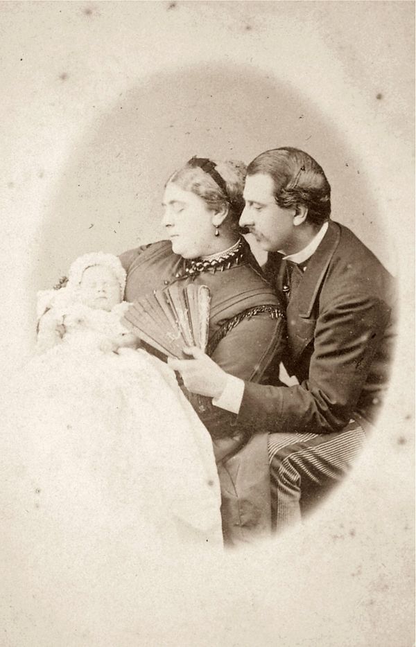 Mary as an infant with her parents