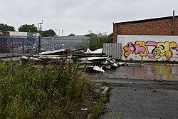 This image depicts all that remains of the former Esso petrol station's canopy.