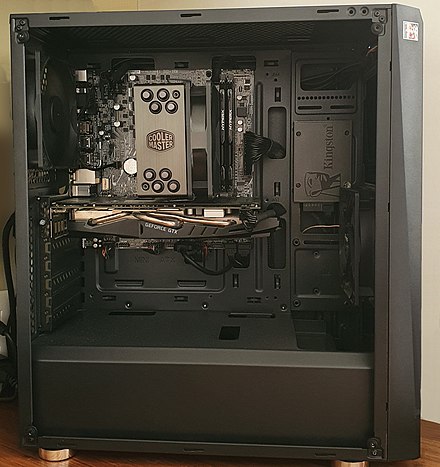 An ATX case. The motherboard (MicroATX) is in a horizontal position at the top, and the peripheral connectors go at the panel located at the rear of the case and USB ports at the top. The fans are also at the rear and front. The power supply is on the bottom rear.