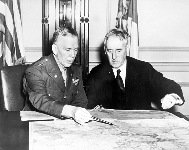 The Chief of Staff of the United States Army, George C. Marshall (left) confers with the Secretary of War, Henry L. Stimson, in January 1942