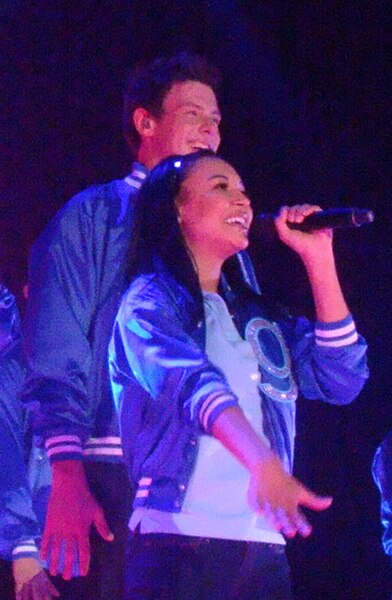 Naya Rivera and Cory Monteith performing during the Glee concert tour in 2011.