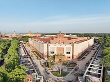 Parliament House, New Delhi, India. The Commonwealth Charter states the Commonwealth's commitment to democracy, and many Commonwealth countries use the Westminster system. Glimpses of the new Parliament Building, in New Delhi (2).jpg