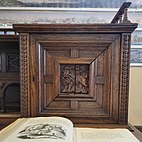 carved door on the Grinnell desk featuring a lion