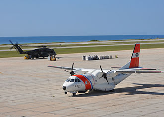 An HC-144A and U.S. Navy MH-53E at Guantanamo Bay, Cuba HC-144A USCG at Guantanamo Bay 2010.jpg