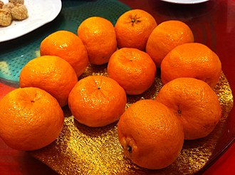 Mandarins, here served in a Hong Kong restaurant, are among the oldest cultivated citrus fruits. HK Hai Yi Ban Dao South Horizons Zhu Hu Ju Le Bu Residents Club Dinner Bao Hu Jiu Jia Treasure Lake Restaurant Madarines Gan fruit Jan-2013.JPG