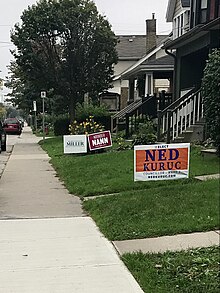 Election lawn signs in Hamilton's St. Claire neighbourhood in October, 2018 HamiltonElectionSigns Nann Kuruc Miller 2018.jpg