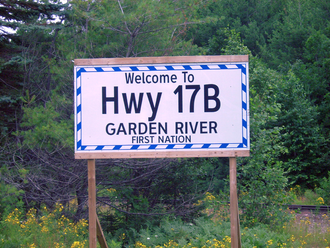 Unofficial Highway 17B sign placed by the Garden River First Nation Hwy 17B Garden River sign.png