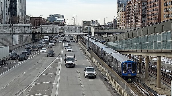 A Blue Line train of 7000-series cars leaving UIC-Halsted station on the Congress branch