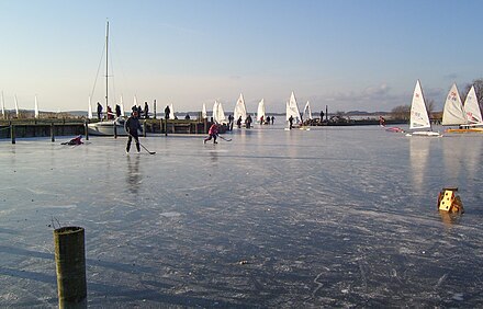 Ice hockey and ice sailing on the frozen-over Arresø, Denmark's largest lake