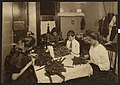 Jewish family working on garters in kitchen for tenement home. (For complete details see Miss E.C. Watson's report.) LOC cph.3a38584.jpg