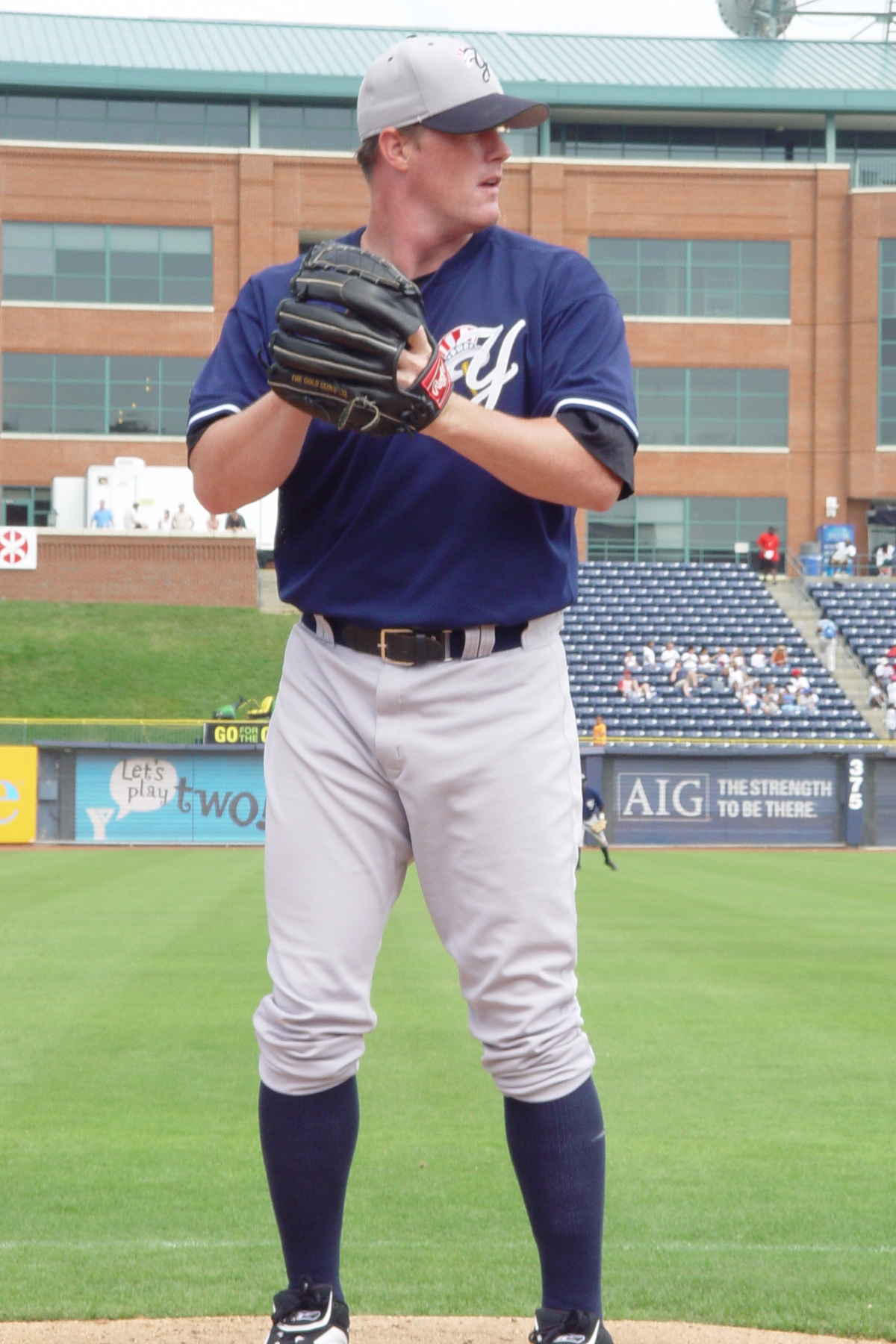 Baseball: Spring training opens; Indians sign pitcher Bruce Chen