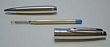 Twist action ballpoint pen with large capacity G2 type refill Jinhao 182 twist action ballpoint pen disassembled.jpg