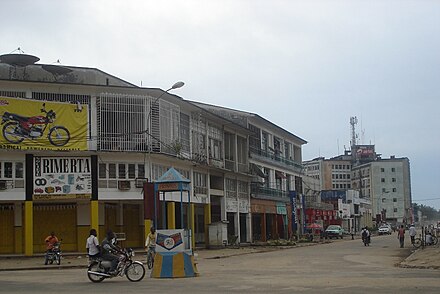 Typical, drab street scene in Kisangani. Note the lack of cars.