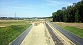 * Deutsch: Baustelle Koralmbahn in der Nähe von Groß Sankt Florian, Steiermark. Abschnitt Wettmannstätten-St. Andrä. Blickrichtung Osten * English: Construction site of the Koralm railway near Groß Sankt Florian, Styria. Section Wettmannstätten-St. Andrä. View towards the East.