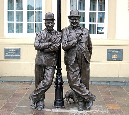 Statue of Stan Laurel and Oliver Hardy outside the Coronation Hall Theatre, Ulverston, Cumbria, England (Laurel's birthplace)