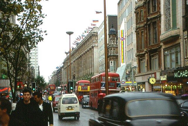 Double decker buses and black cabs on Oxford Street, 1987