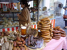 Delicatessen on a shelf at the market in Lutry. LutryWurste.JPG