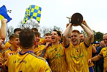 Conor Dolan lifts the cup