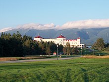 The new International Monetary System which would embody the values of embedded liberalism was largely designed at the Bretton Woods Conference, hosted at the Mount Washington Hotel in 1944 Mtwashingtonresort.JPG