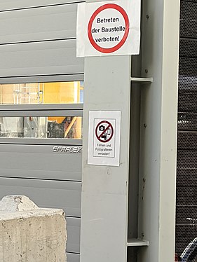 A photograph of a no photography sign