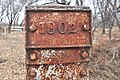 North Gypsum Creek Truss Leg Bedstead Bridge McPherson Co Kansas View east 1902 plaque.jpg