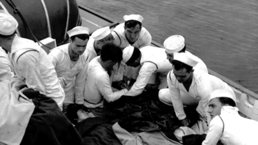 USS Louisville crew assist passengers