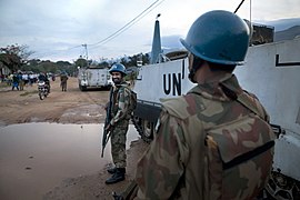 Pakistani troops under a UN peacekeeping coalition patrolling the streets of Uvira in South Kivu, Democratic Republic of the Congo Pak-Uvira-06 (8137990941).jpg