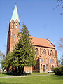 Church with cemetery, stone wall and portal