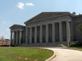 The Ridgeway Library building was built 1873-78 at 900 South Broad Street, as a late example of Greek Revival architecture, with a bequest by Dr. James Rush to honor his wife, Phoebe Ann Ridgeway, for the Library Company of Philadelphia. Architect was Addison Hutton. Now occupied by the Philadelphia High School for the Creative and Performing Arts with a large 1997 addition in the rear. View from Broad Street