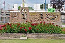 Relief wall, in front of the school